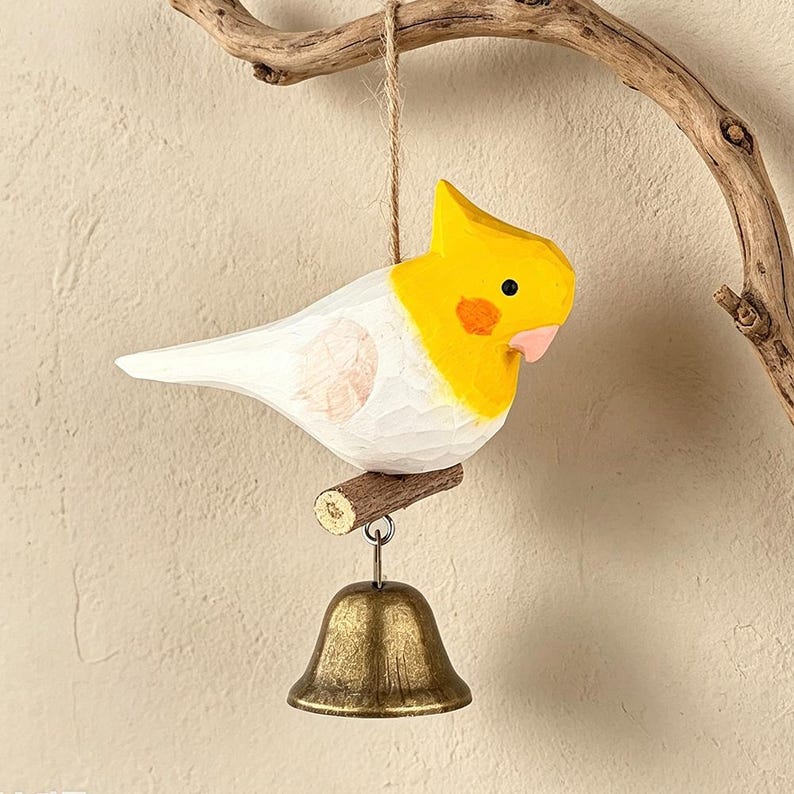 Carillon éolien en bois sculpté à la main avec perruche et clochette en laiton, hauteur 4 cm